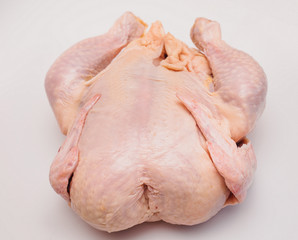 Raw chicken isolated on white background. Isolated on a white background.