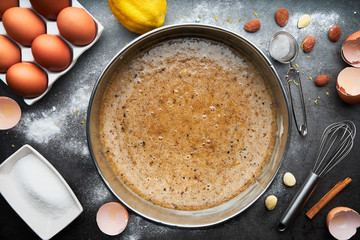 Still life of preparation of mold for the elaboration of a cake with ingredients. Food concept. Dessert. Santiago cake. Step 4