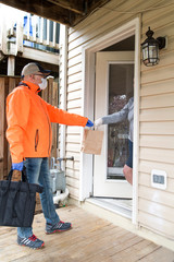 Fototapeta premium masked delivery worker