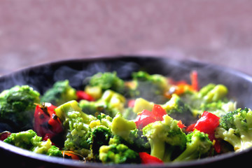 vegetables in a pan standing on the stove, vegetable stew, healthy vegan food