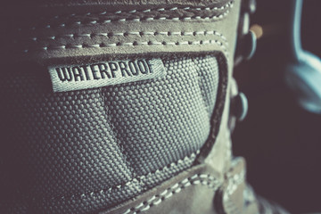 Close-up of waterproof label view on leather shoes or clothes