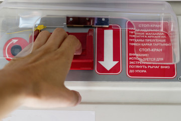 Close up hand and emergency brake in the Talgo wagon train. Kazakhstan railway travel