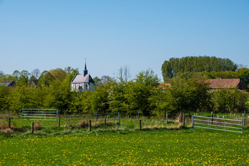 Aijen, Limburg, Netherlands - 15 April 2020: An old church in the small village Aijen Maasduinen area.