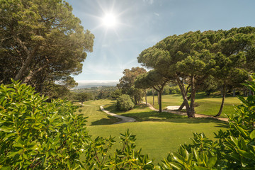 Golf course with sun facing.