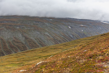View of the valley. Northern Sweden, Sarek National Park in stormy weather. selective focus