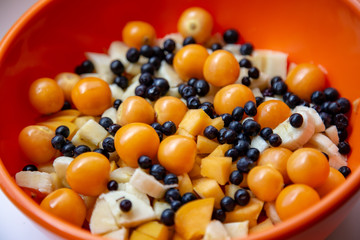 Plate of chopped fruits for breakfast