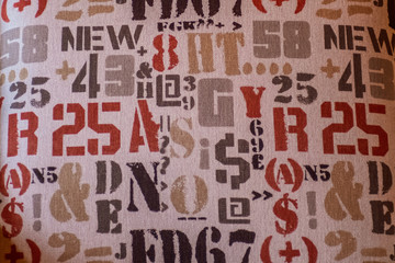 Number and letter fabric texture background