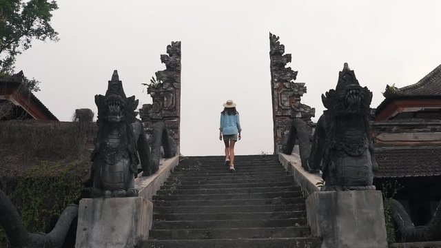 girl in a buddhist temple on Bali