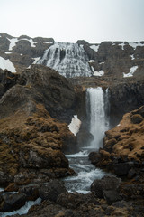 Beautiful waterfall in west fjords of Iceland in spring