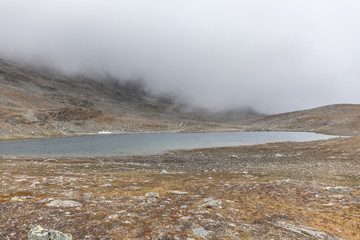 Blue lake in the Arctic mountains of a Sarek National Park.