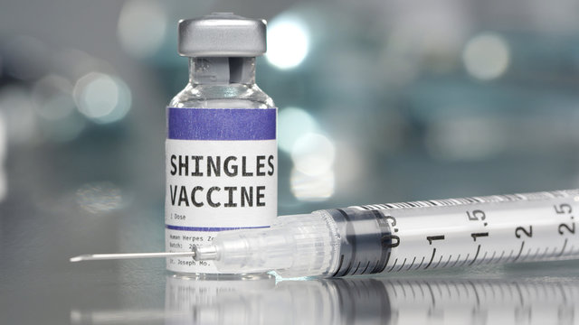 Shingles vaccine vial in medical lab with syringe