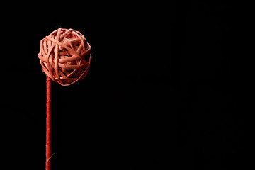 red ball on black background