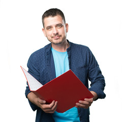 Young man wearing a blue outfit. Holding a red folder. © borjandreu