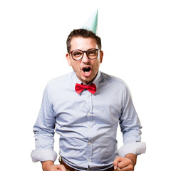 Man wearing a red bow tie and party hat. Looking upset.