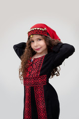 Arabian adorable girl in bedouin traditional cloths 