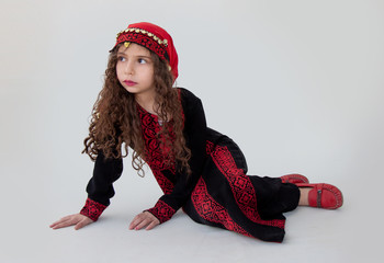 Arabian adorable girl in bedouin traditional cloths 