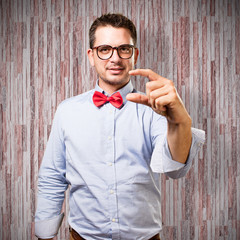 Man wearing a red bow tie.