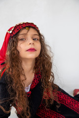 Arabian adorable girl in bedouin traditional cloths 