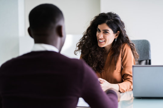 Female Manager Interviewing A Male Applicant