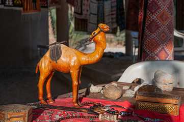 Close up of leather handcrafted camel statue, exposed on a street stand in Tunisia