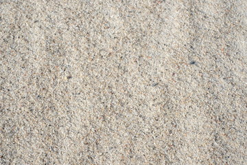 Sand background. Full frame. Empty even sand beach background in daylight for your design