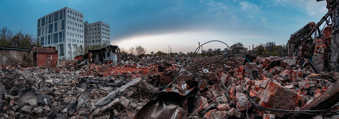 Ruins of old demolished industrial building. Disaster or war consequences concept
