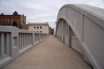 Walkway in a bridge in the old town of Cambridge, Ontario during cloudy weather 
