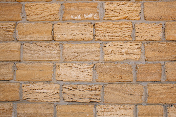 The wall of the old brick is beige. Background of brick