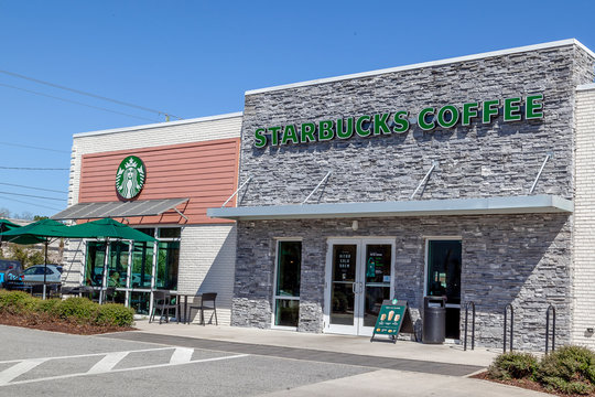 Charleston, South Carolina, USA - February 28, 2020: A Starbucks coffee store in Charleston, South Carolina, USA. Starbucks Corporation is an American coffee company and coffeehouse chain.