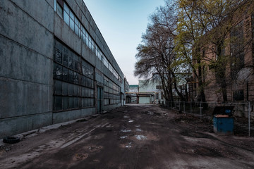 Depressive territory of abandoned industrial area, old warehouses