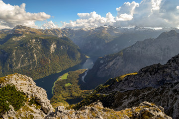 view from Mt. Kleiner Watzmann towards lake Koenigssee with peninsula St. Bartholomae and Berchtesgaden national park, Bavaria, Germany