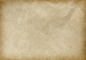  Old vintage paper with a glowing center and grunge vignette.