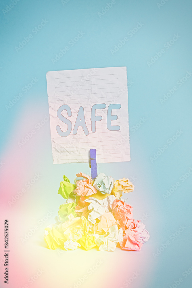 Poster writing note showing safe. business concept for protected from or not exposed to danger or risk not 