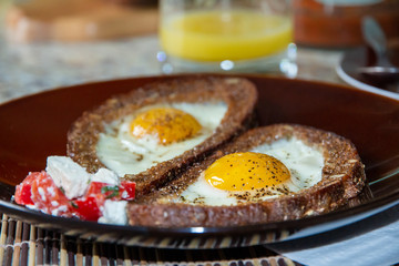 Organic Sunnyside up Egg in toast for breakfast

