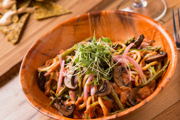 Raw Spaghetti Bowl with Mushrooms and Tomato Sauce