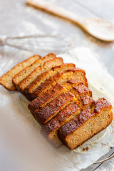 Banana Bread with Ingredients on Grey Background