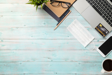 Flat lay of work from home, workspace with laptop and smartphone, credit card shopping online...
