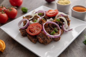African national dish. Nigerian meal. Healthy lifestyle dish with red onions tomatoes. Salad dish. 