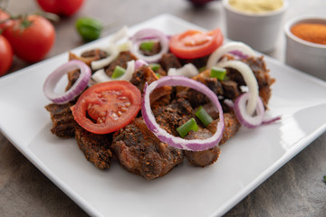 African national dish. Nigerian meal. Healthy lifestyle dish with red onions tomatoes. Salad dish. 