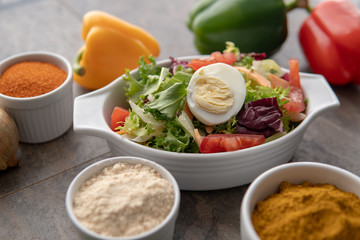 African national dish. Nigerian meal. Healthy lifestyle dish with red onions tomatoes. Salad dish. 