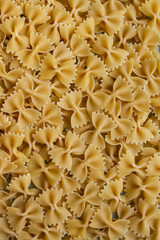 not cooked pasta sprinkled from a close angle