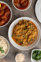 African national food dish grilled meat and chicken dish wings home-made Cuisine with plantain with jollof rice. Nigerian Jolofrice. Grilled African fish dish and meal with chilli banana and plantain.