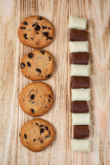 cookies with chocolate on a light wooden table