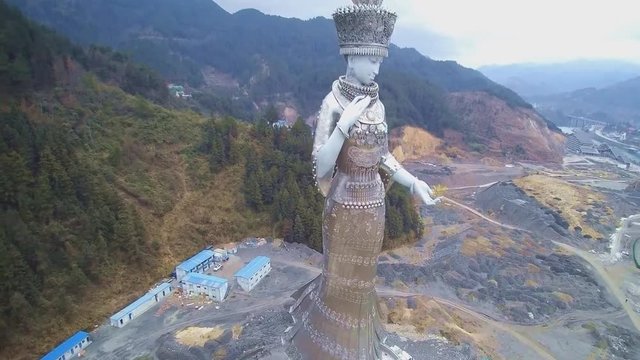 The statue “Yang Asha,” located beside Yang Asha Lake, Jianhe County (aerial photography)