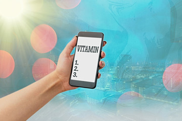 Conceptual hand writing showing Vitamin. Concept meaning group of organic compounds which are...