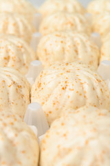 traditional Chinese buns in a package close up verical composition