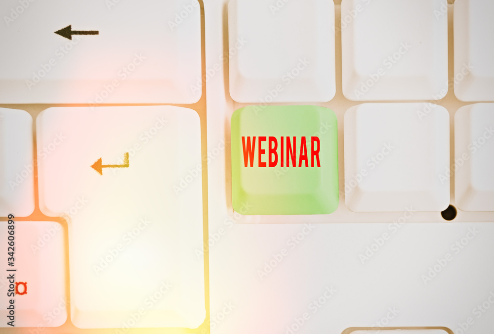 Poster writing note showing webinar. business concept for defined as seminar conducted over the internet we