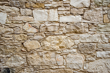 Fragment of an ancient wall in the village of Omodos. Cyprus