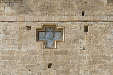 Knight's emblem on the Eastern wall of the medieval castle of Kolossi (Cyprus)