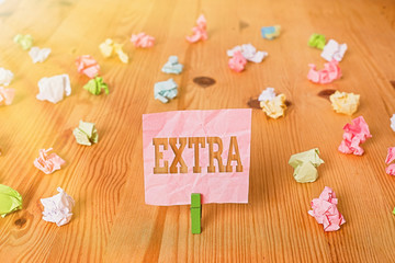 Text sign showing Extra. Business photo showcasing Added to existing or usual amount number In...